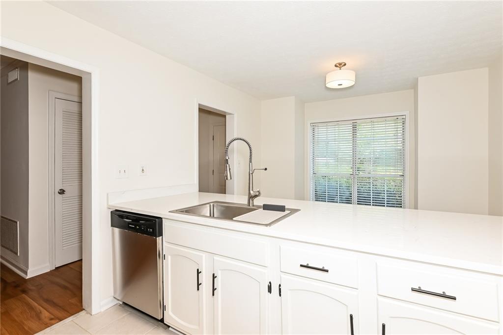 201 Lenox Way Northeast Atlanta, GA 30324 - Photo 5 of 15 a close view of sink and tap