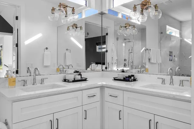 a bathroom with a toilet a sink and bathtub