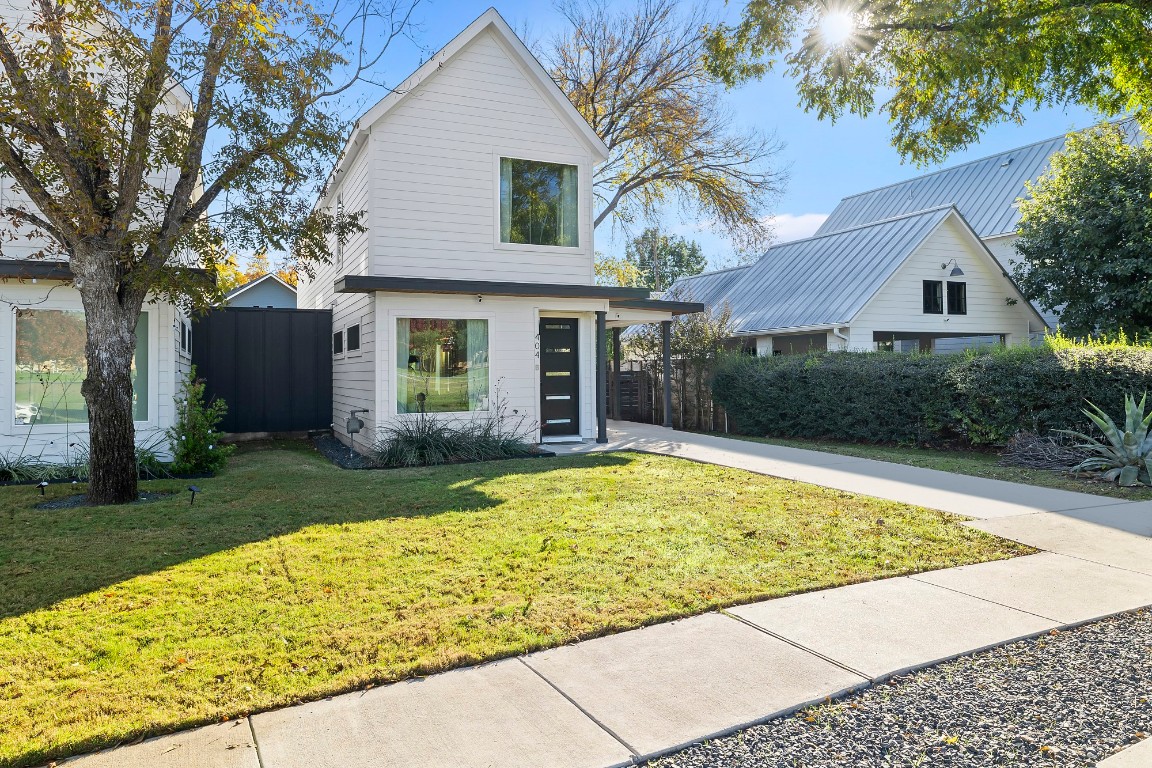 404 Powell Circle, Unit B Austin, TX 78704 - Photo 2 of 33 a view of house with a swimming pool