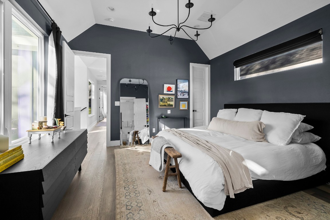 404 Powell Circle, Unit B Austin, TX 78704 - Photo 22 of 33 a bed room with a bed window and a couch