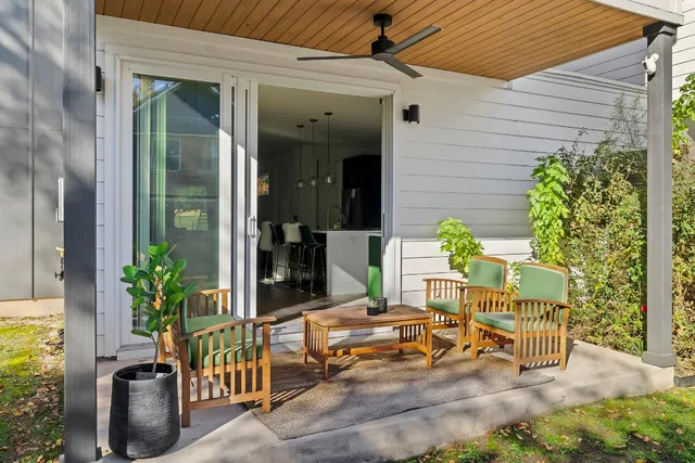 a view of a house with a backyard