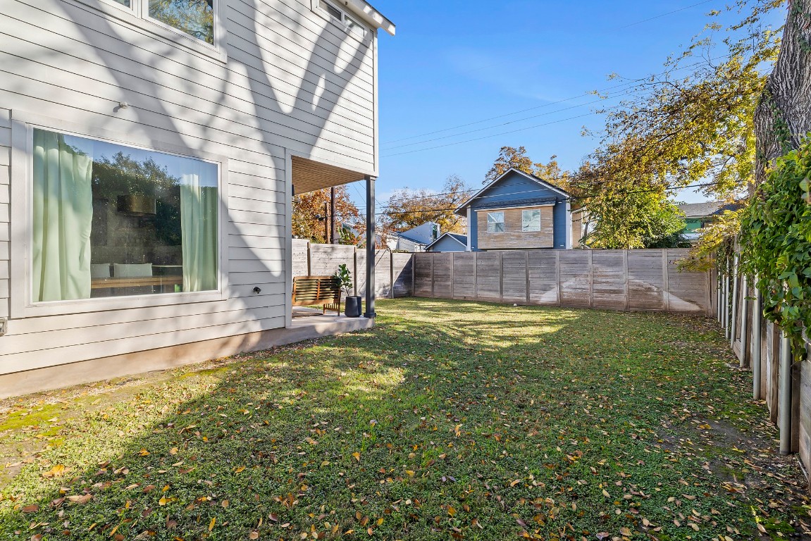 404 Powell Circle, Unit B Austin, TX 78704 - Photo 30 of 33 a view of a house with a backyard