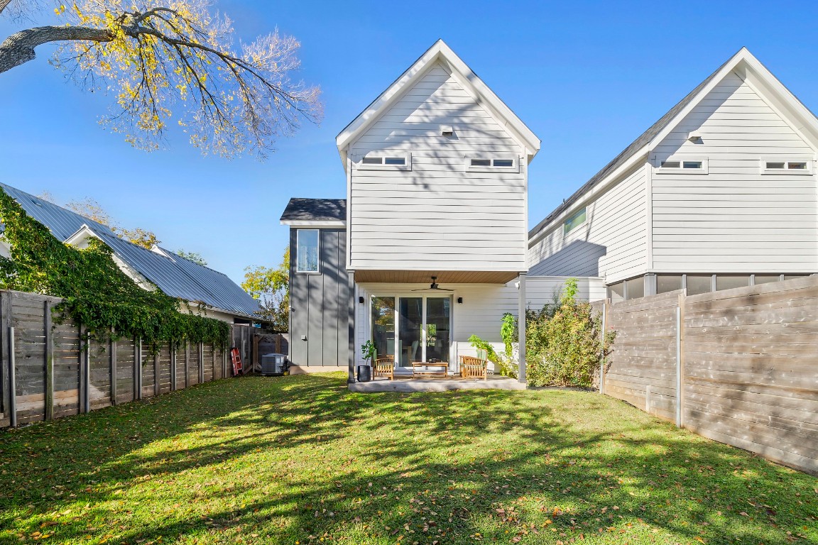 404 Powell Circle, Unit B Austin, TX 78704 - Photo 32 of 33 a front view of a house with a garden