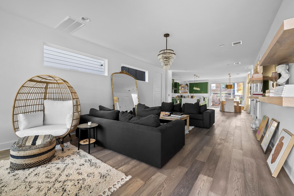 404 Powell Circle, Unit B Austin, TX 78704 - Photo 4 of 33 a living room with furniture and a wooden floor