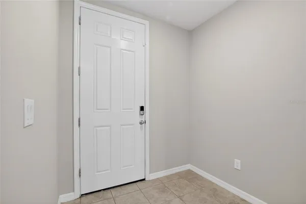 a kitchen with granite countertop a sink and a window