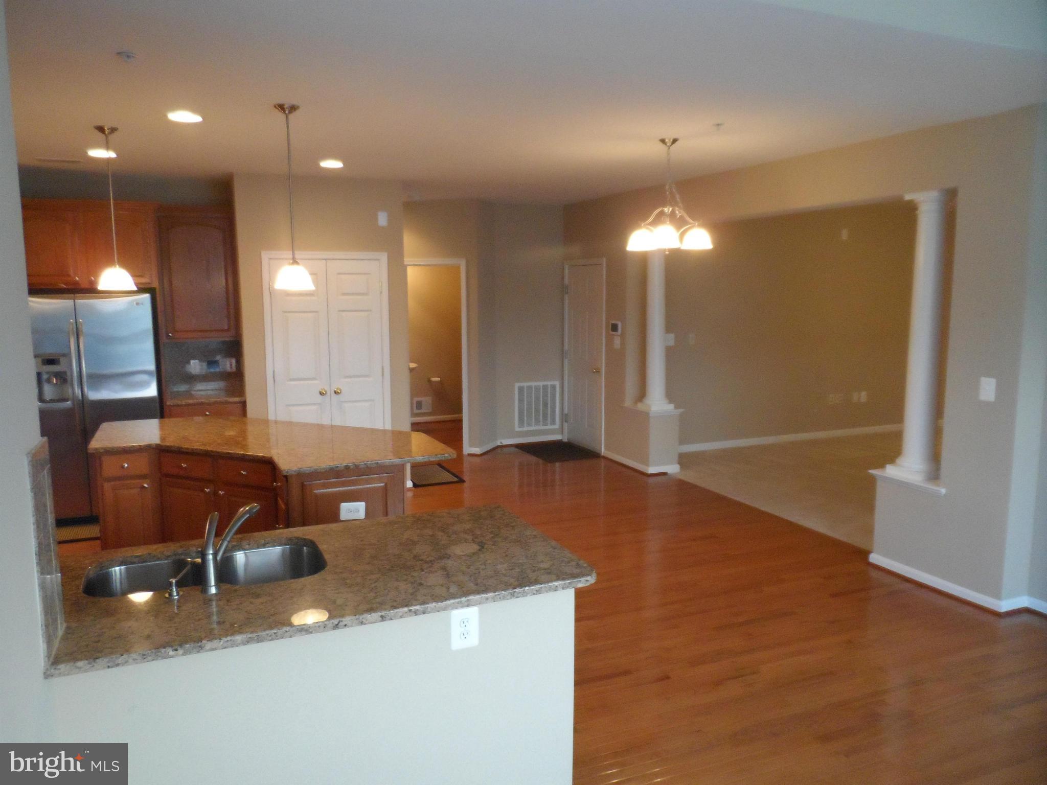 12711 Tayman Farm Road Brandywine, MD 20613 - Photo 10 of 24 Kitchen & Family Room