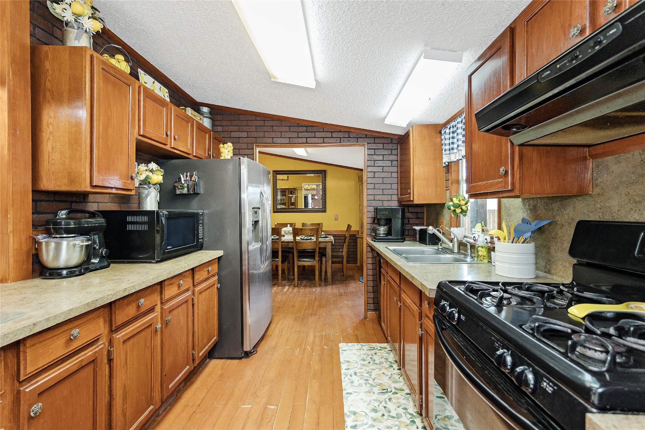 Tbd Wiggins Road Conroe, TX 77302 - Photo 11 of 16 a kitchen with lots of counter top space and stainless steel appliances