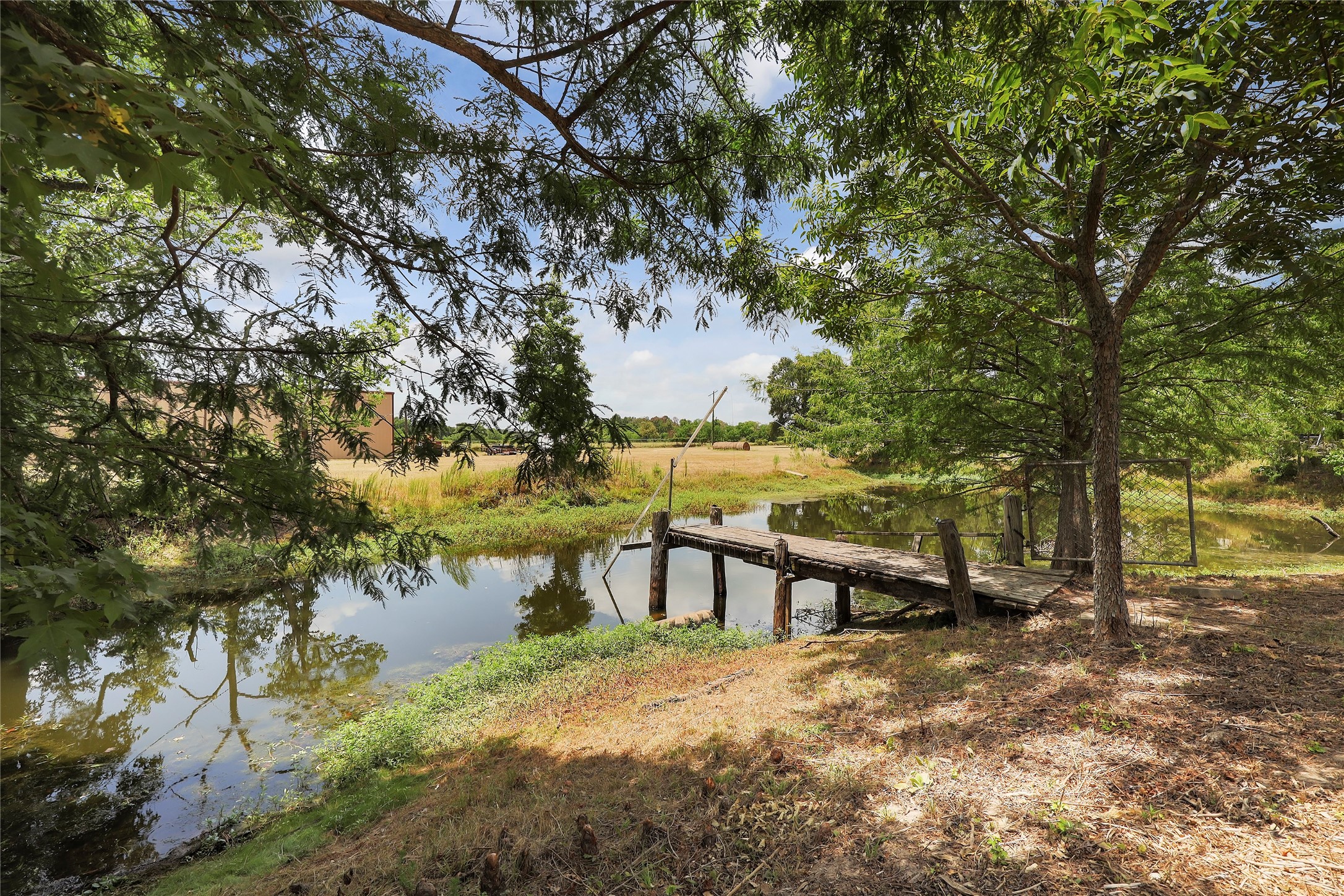 Tbd Wiggins Road Conroe, TX 77302 - Photo 3 of 16 a view of a yard with a house in the background