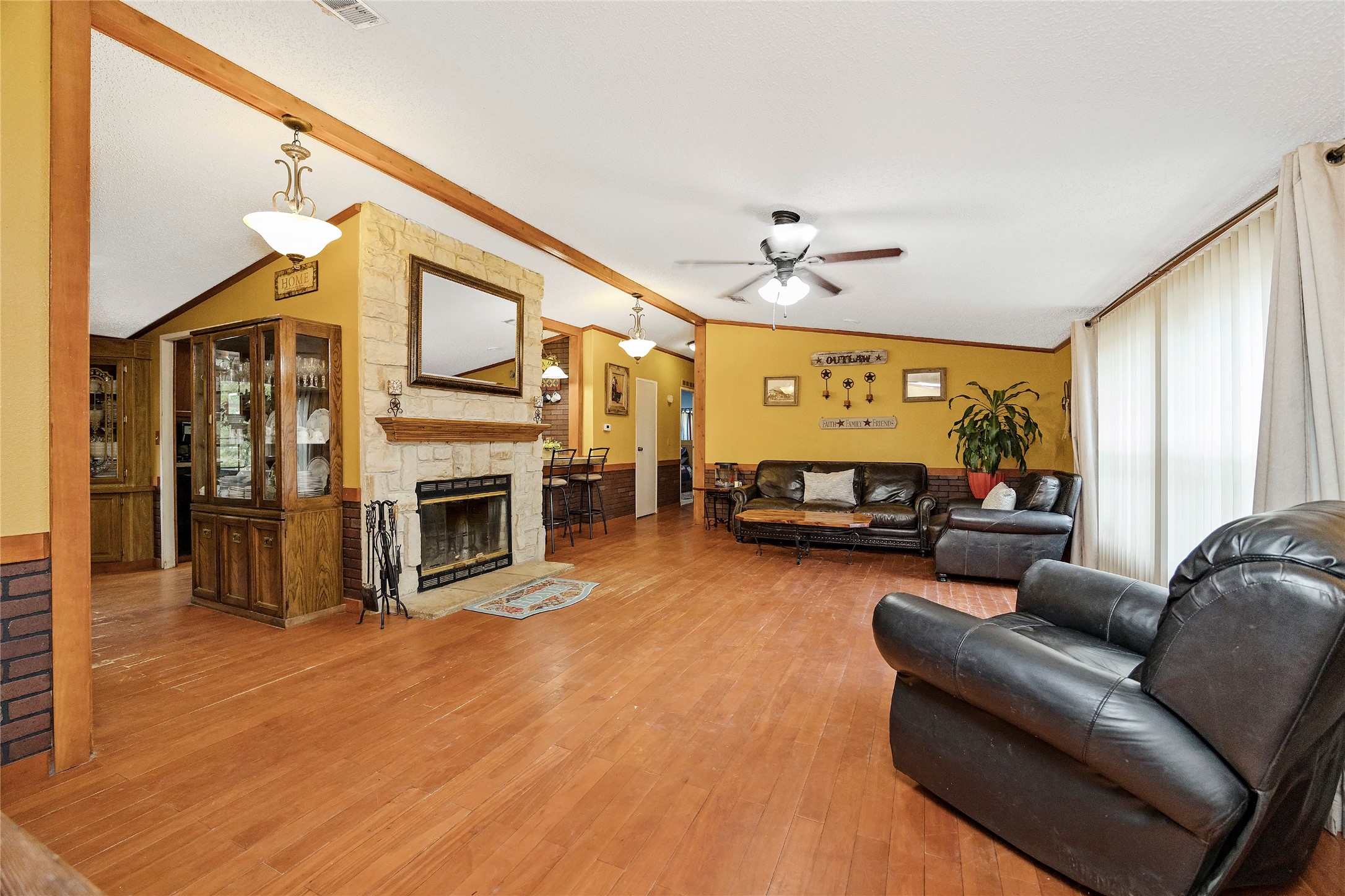 Tbd Wiggins Road Conroe, TX 77302 - Photo 10 of 16 a living room with furniture fireplace and flat screen tv