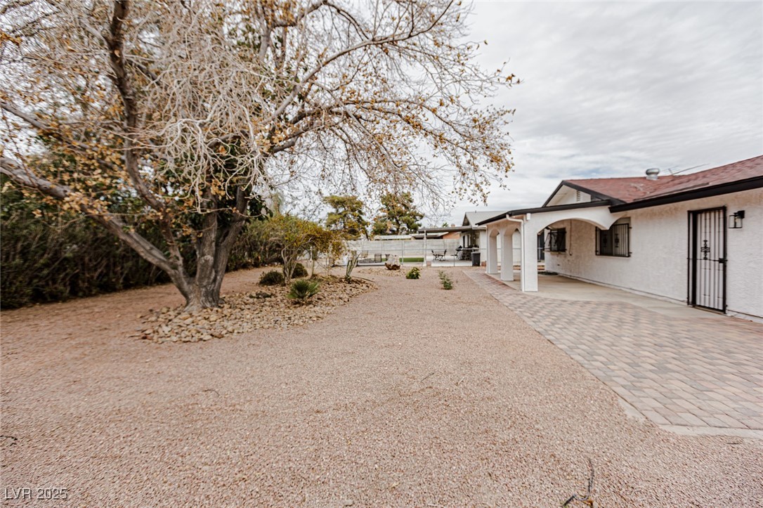 661 Riata Way Las Vegas, NV 89110 - Photo 27 of 30 View of yard with a patio area