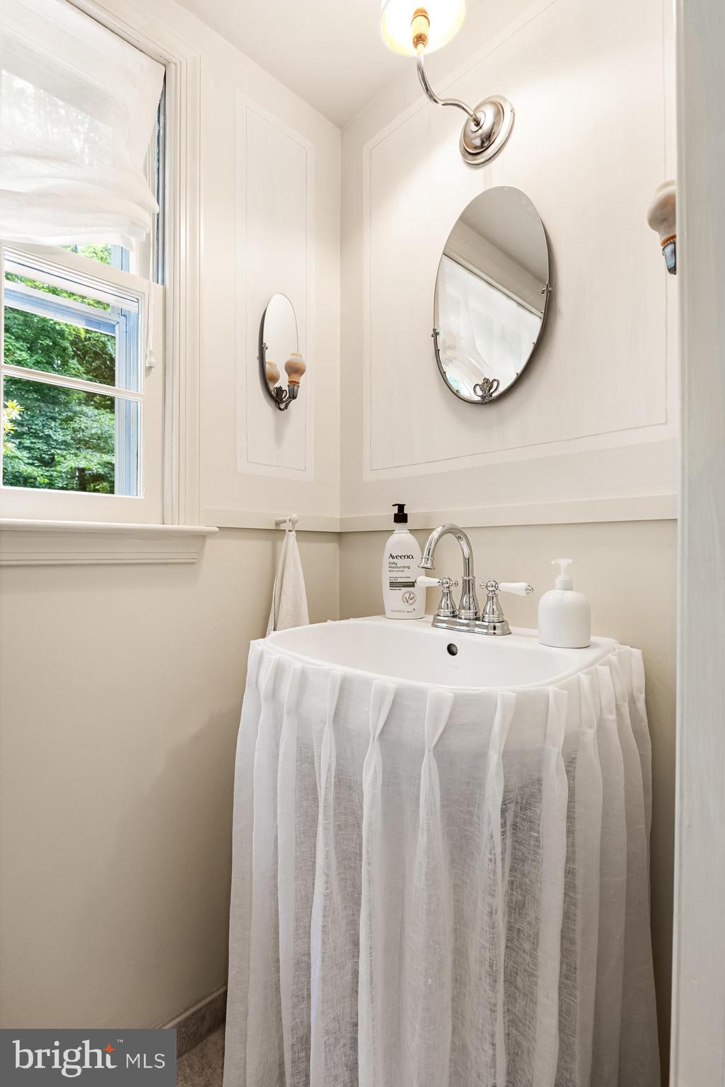 118 Barcroft Drive Cherry Hill, NJ 08034 - Photo 40 of 75 a bathroom with a sink mirror and vanity