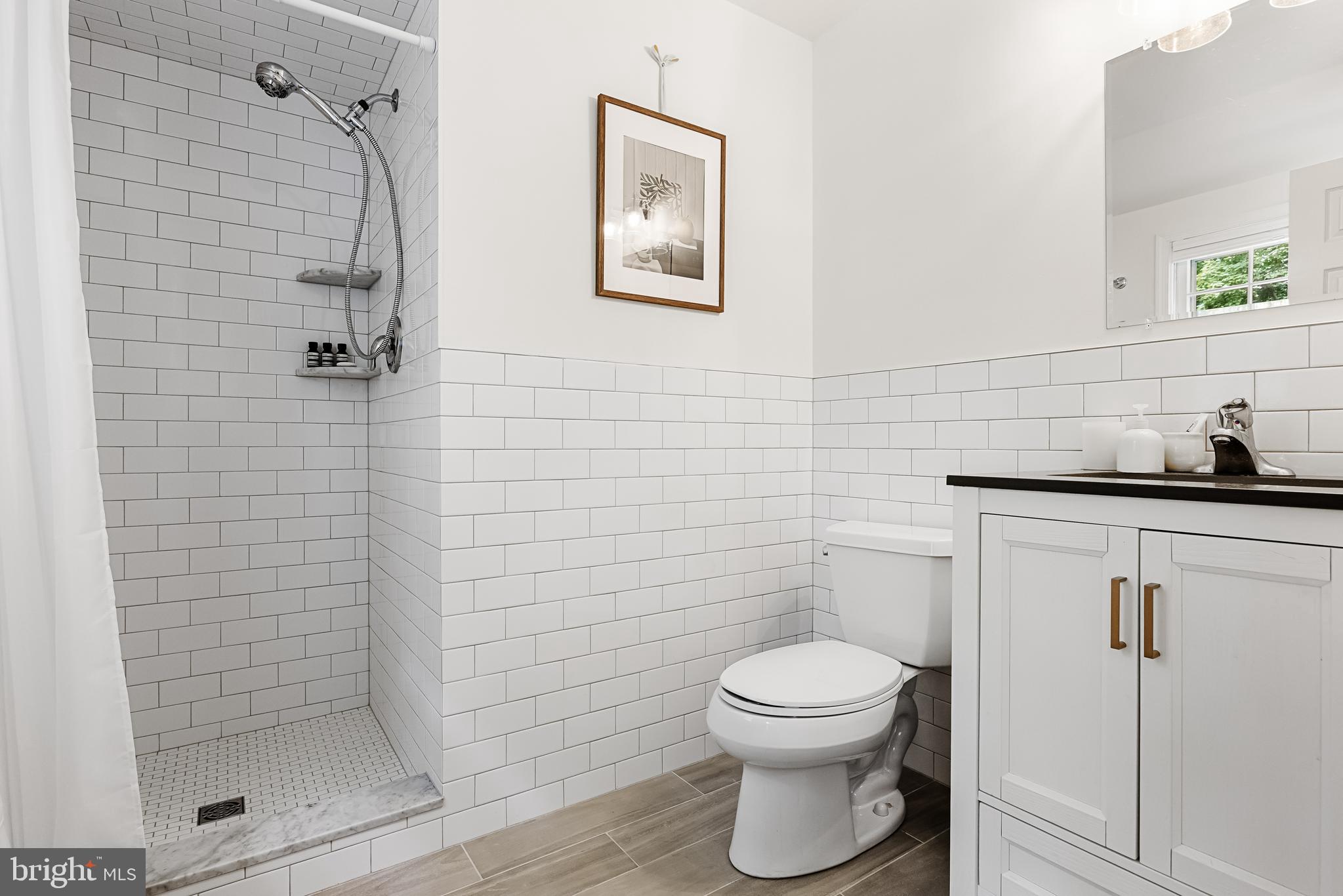 118 Barcroft Drive Cherry Hill, NJ 08034 - Photo 56 of 75 a bathroom with a toilet and a shower