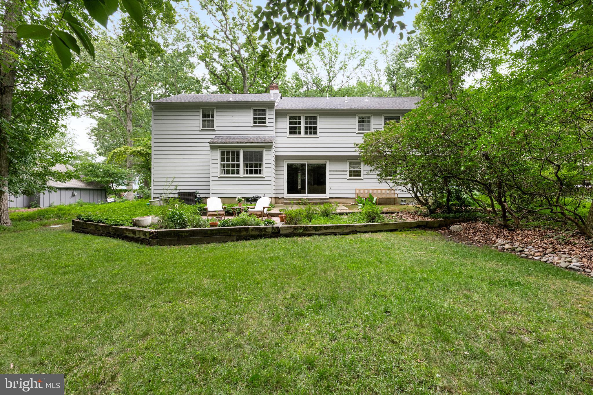 118 Barcroft Drive Cherry Hill, NJ 08034 - Photo 65 of 75 a front view of house with a garden and trees