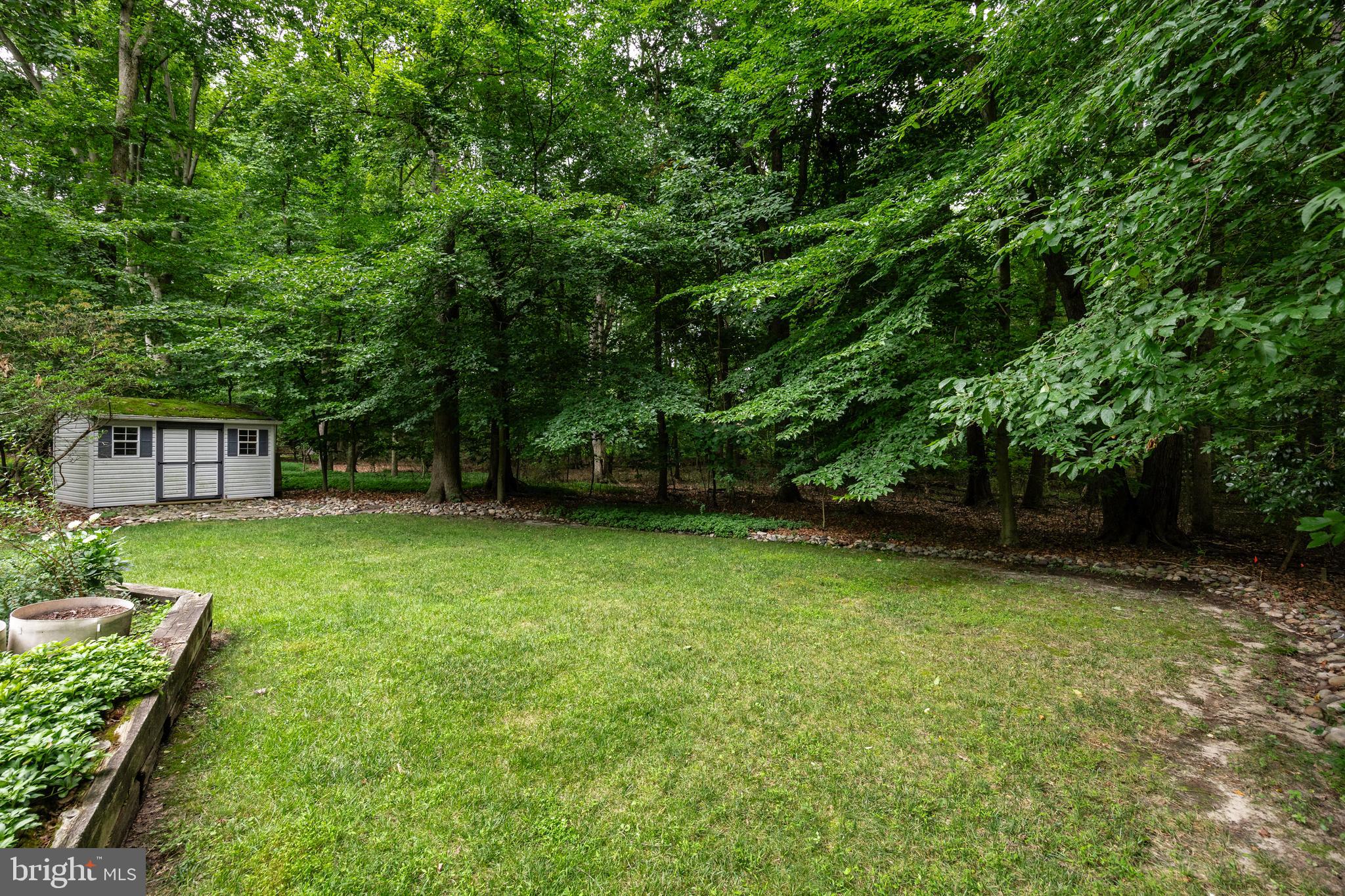 118 Barcroft Drive Cherry Hill, NJ 08034 - Photo 72 of 75 a view of a backyard with a garden
