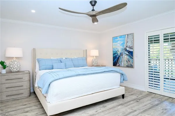 a bed room with a bed and a window