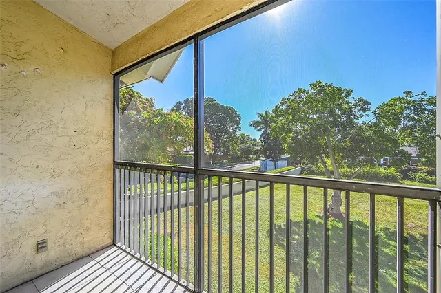 a view of a balcony with an outdoor space