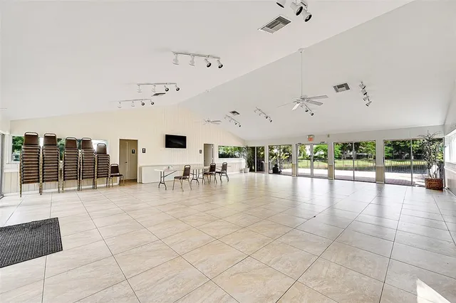a view of kitchen with furniture and floor to ceiling window