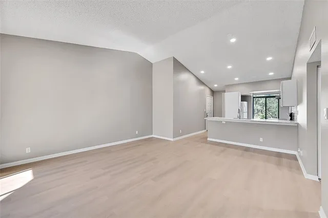 a view of an empty room with window