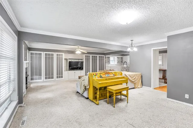 a swimming pool with window and couch