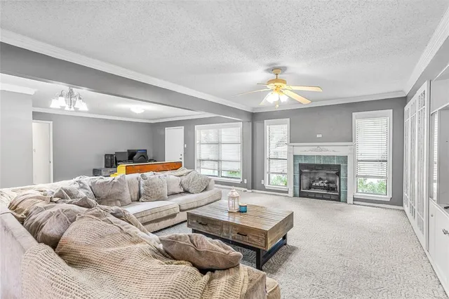 a bedroom with furniture and a fireplace