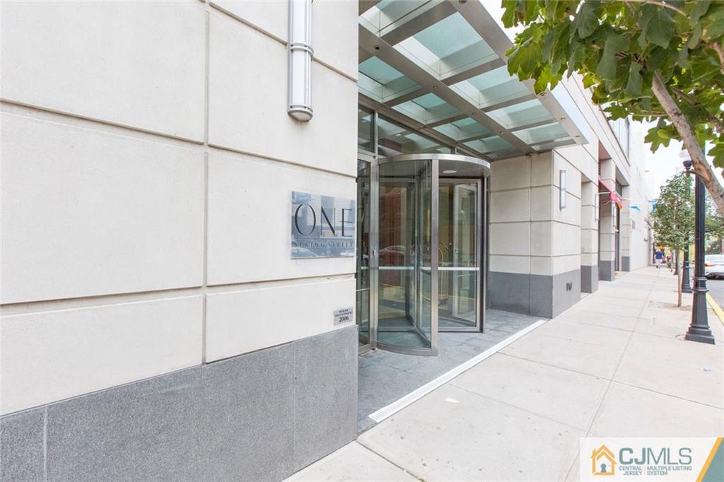 1 Spring Street, Unit 1704 New Brunswick, NJ 08901 - Photo 3 of 23 a view of a house with a outdoor space