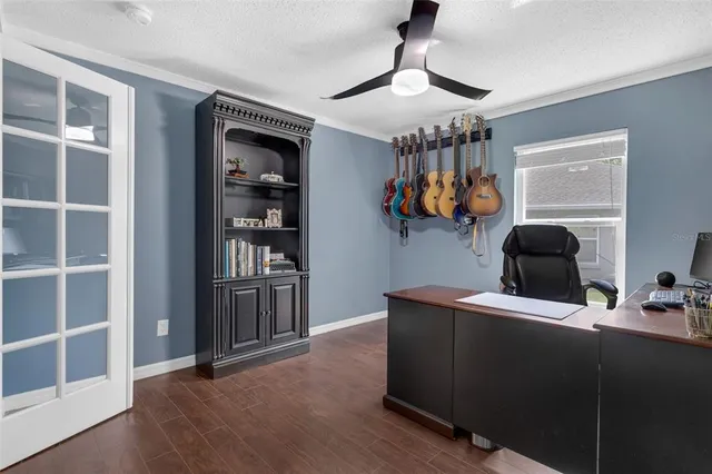 a room with furniture and wooden floor