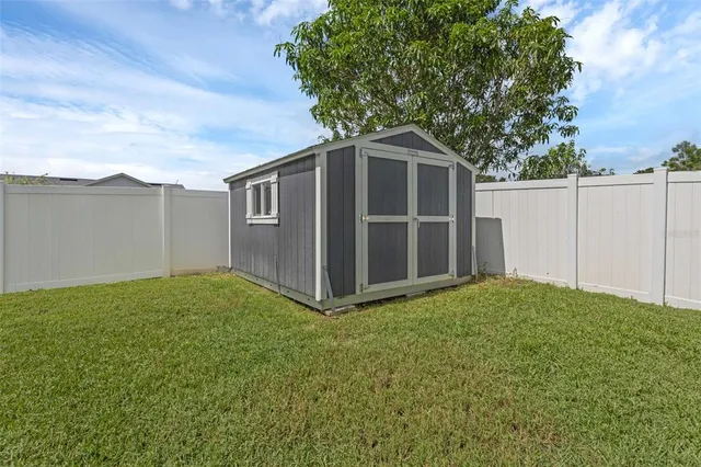 a view of backyard of house