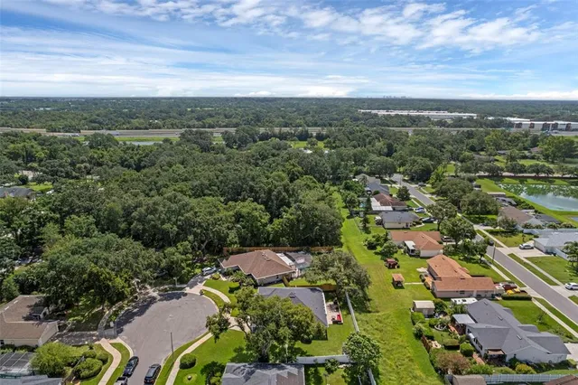 an aerial view of a city with lots of residential buildings