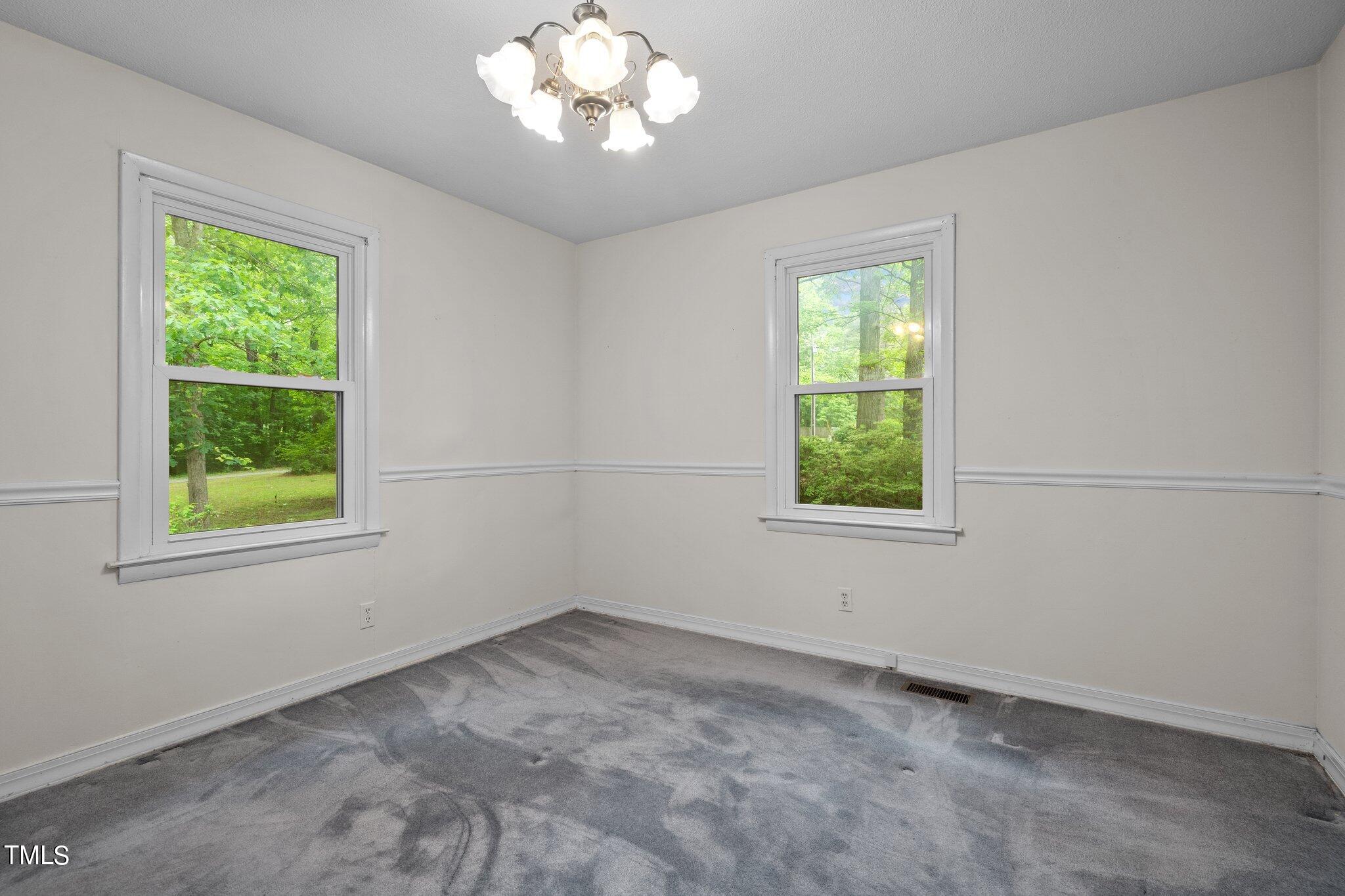 8200 Middleton Road Garner, NC 27529 - Photo 23 of 60 en empty room with windows