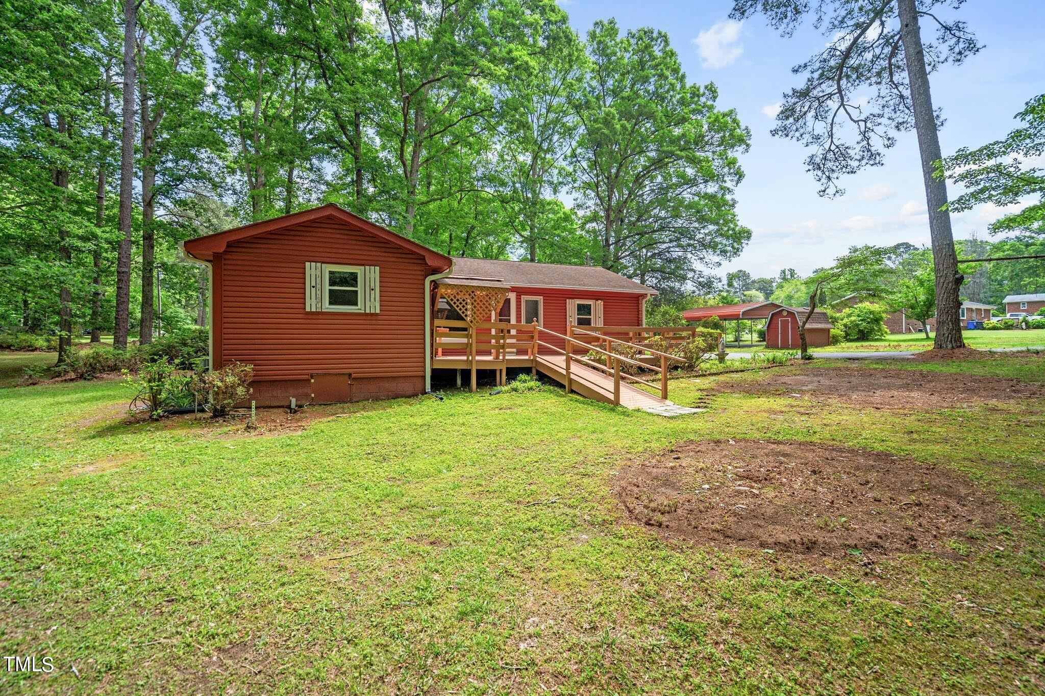8200 Middleton Road Garner, NC 27529 - Photo 47 of 60 a view of a house with a yard