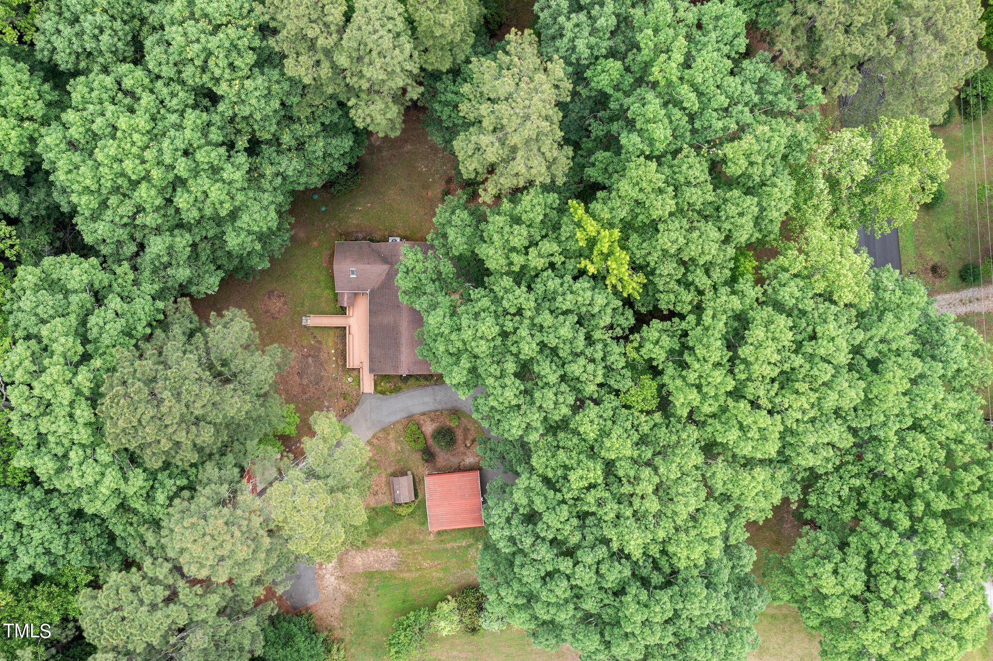 8200 Middleton Road Garner, NC 27529 - Photo 54 of 60 an aerial view of residential house with outdoor space and trees all around