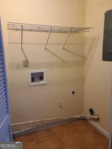 a view of a room with racks on the wall