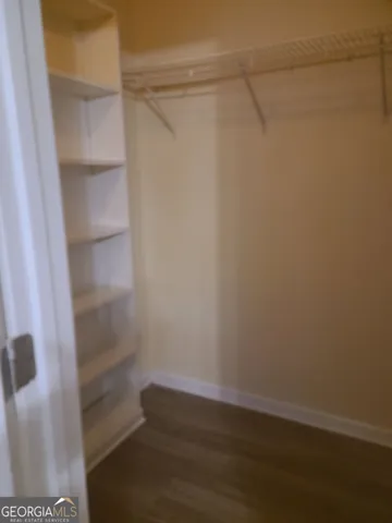 a view of an empty walk in closet