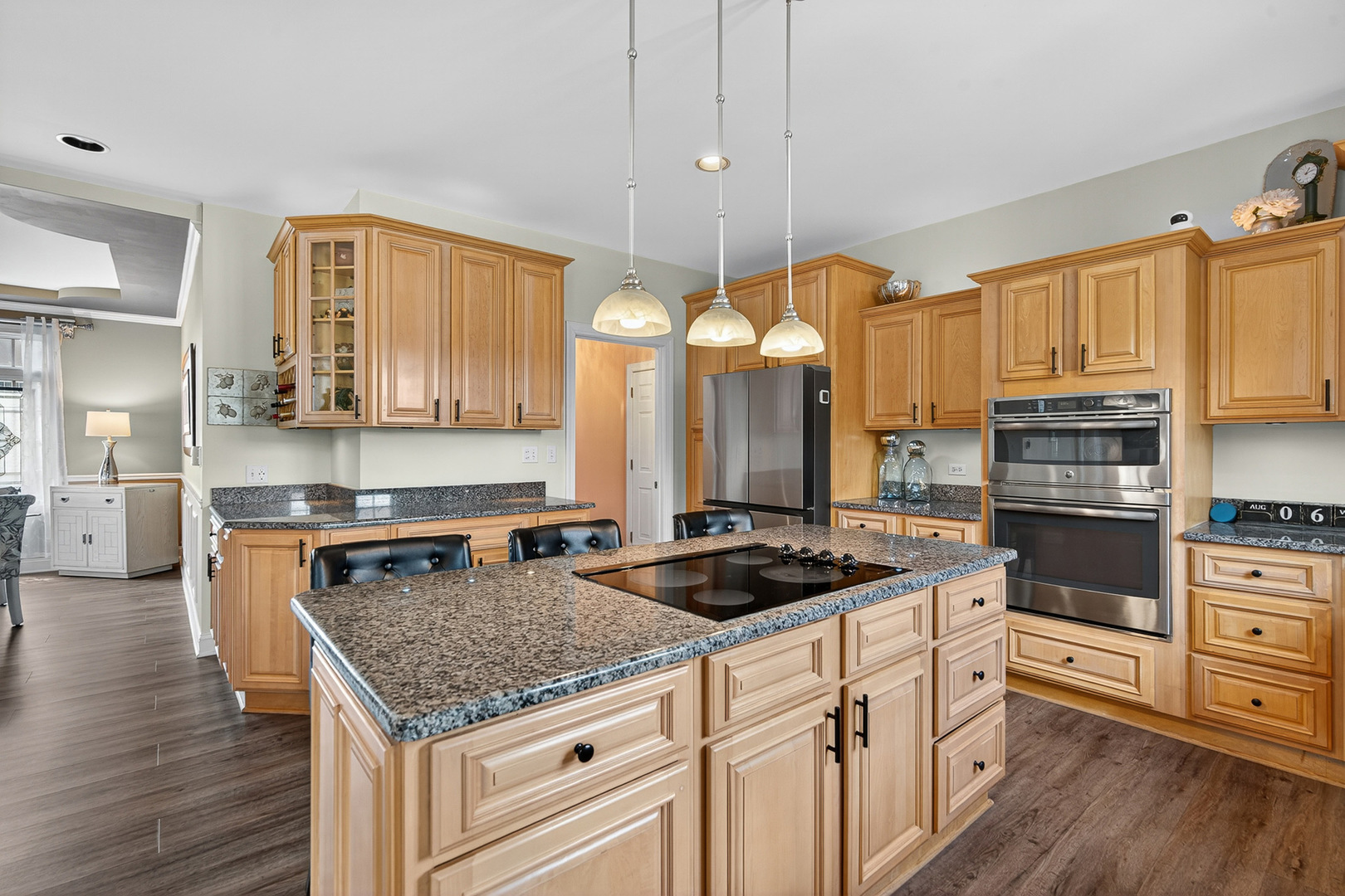 4210 Jacqueline Lane Crystal Lake, IL 60014 - Photo 12 of 48 a kitchen with granite countertop a sink cabinets and wooden floor