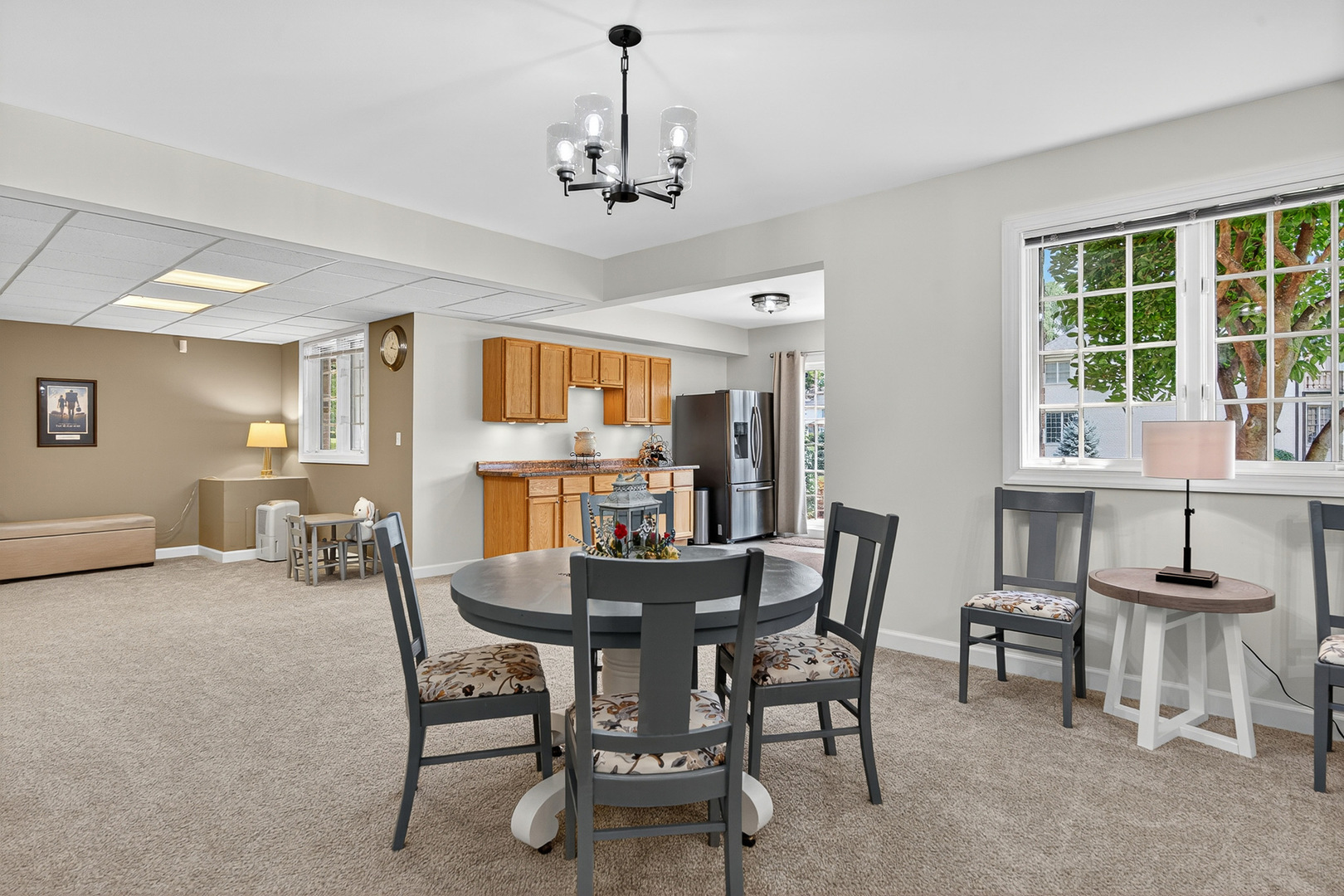 4210 Jacqueline Lane Crystal Lake, IL 60014 - Photo 32 of 48 a view of a dining room with furniture and a chandelier