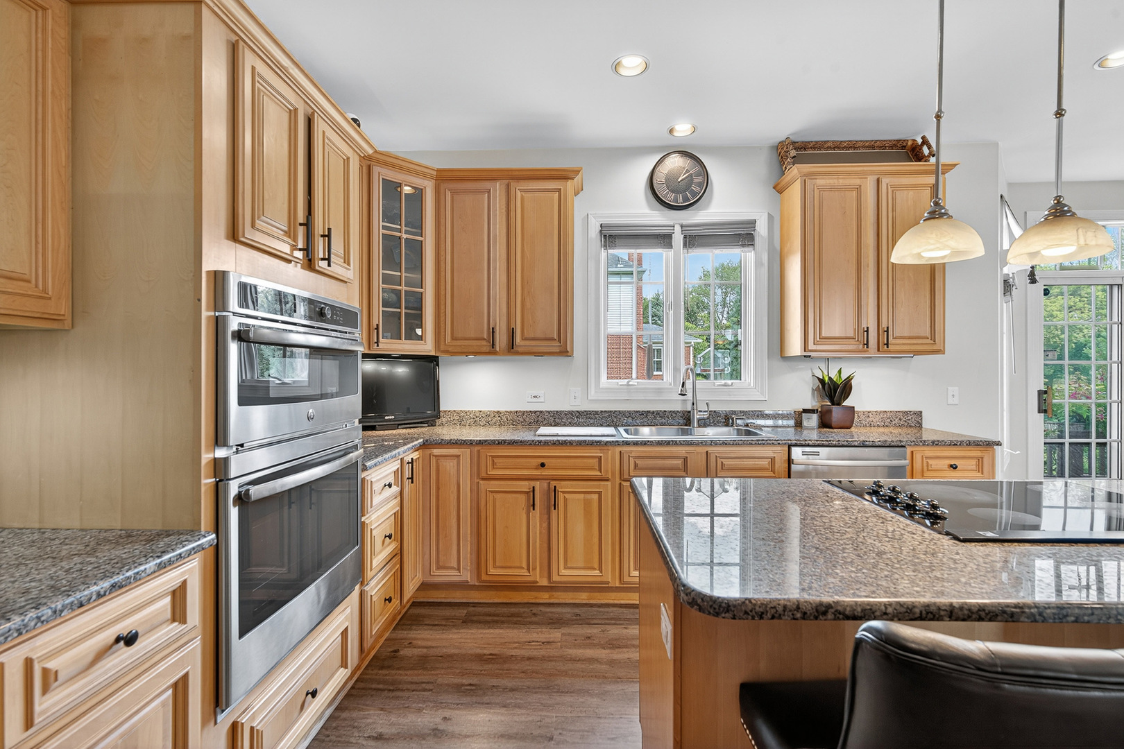 4210 Jacqueline Lane Crystal Lake, IL 60014 - Photo 10 of 48 a kitchen with stainless steel appliances granite countertop a sink stove and refrigerator
