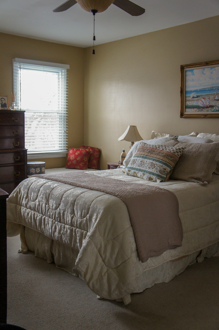 308 College Crossing, Unit 133 Rolling Meadows, IL 60008 - Photo 14 of 16 a bedroom with a bed and window