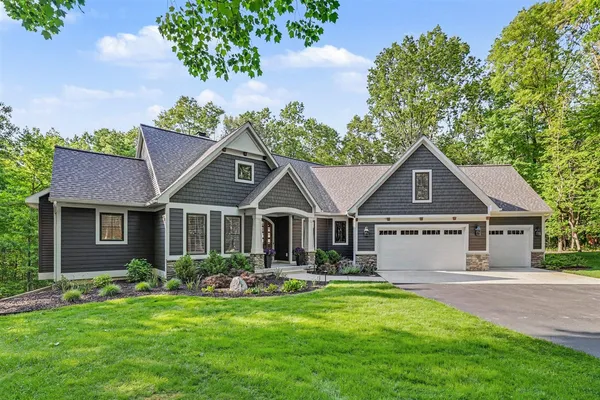 $1,695,000 | 547 Roundtree Drive Northeast, Ada, MI 49301