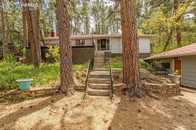 view of a house with a yard