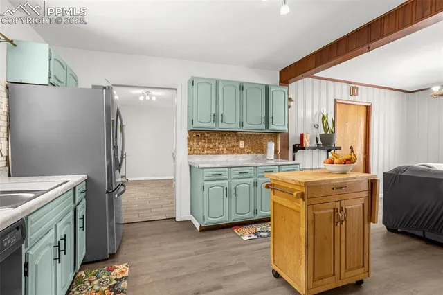 a view of a livingroom with furniture and a fireplace
