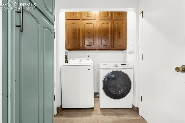 a view of a room with wooden walls