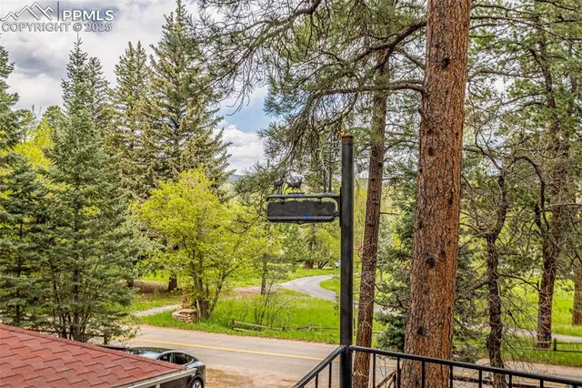 a view of a town with mountains in the background