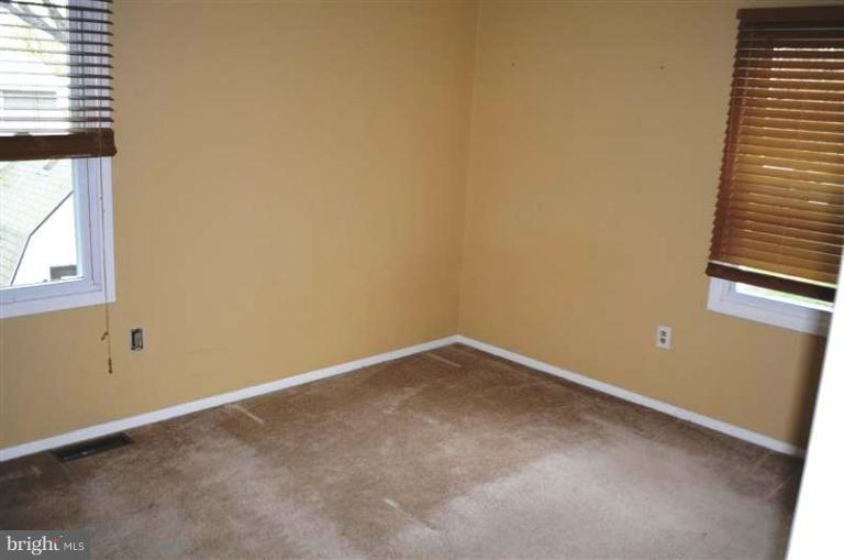 951 Waugh Chapel Road Gambrills, MD 21054 - Photo 12 of 17 an empty room with windows