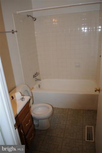 951 Waugh Chapel Road Gambrills, MD 21054 - Photo 4 of 17 a bathroom with a toilet and a shower