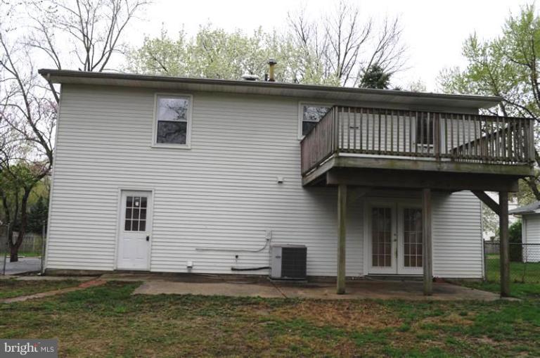 951 Waugh Chapel Road Gambrills, MD 21054 - Photo 8 of 17 a front view of a house with garden