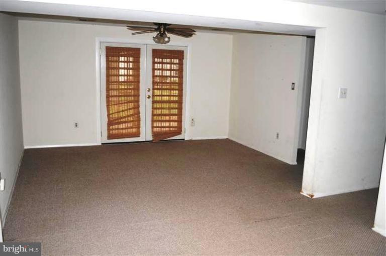 951 Waugh Chapel Road Gambrills, MD 21054 - Photo 9 of 17 a view of empty room with windows