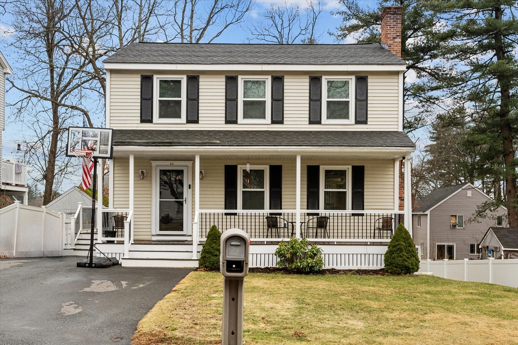 62 Valley Road Dracut, MA 01826 - Photo 1 of 35 a front view of a house with swimming pool