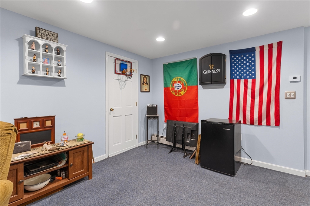 62 Valley Road Dracut, MA 01826 - Photo 20 of 35 a room with furniture and window