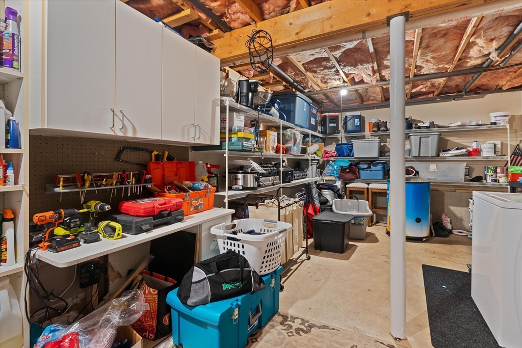 62 Valley Road Dracut, MA 01826 - Photo 21 of 35 a view of store room with racks