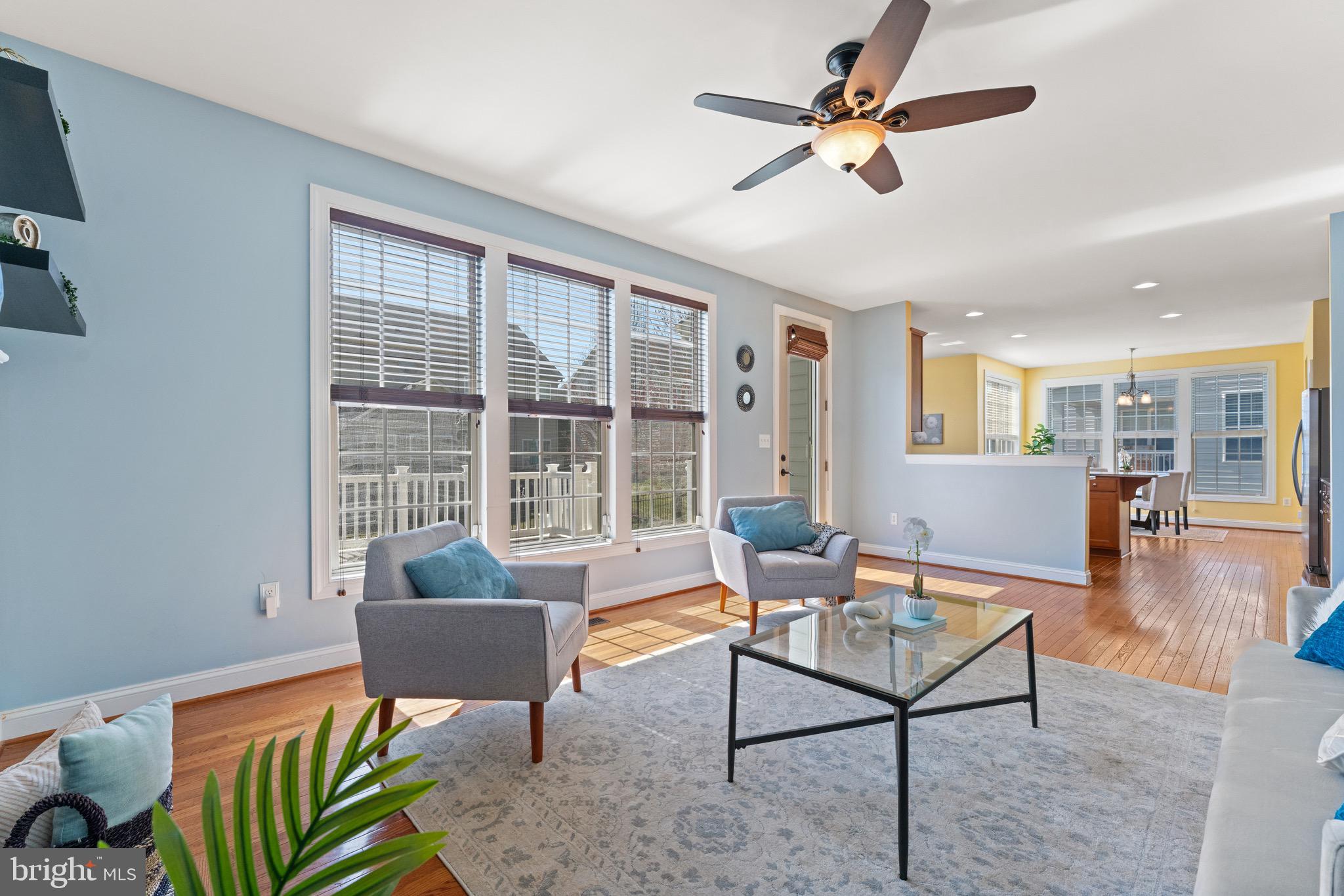 16277 Jetty Loop Woodbridge, VA 22191 - Photo 16 of 92 a living room with furniture a table and a potted plant